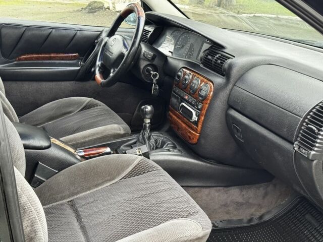 Зеленый Опель Омега, объемом двигателя 2.5 л и пробегом 180 тыс. км за 1499 $, фото 5 на Automoto.ua