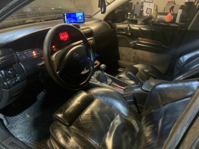 Зеленый Опель Омега, объемом двигателя 2 л и пробегом 37 тыс. км за 1850 $, фото 5 на Automoto.ua