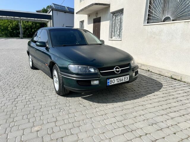 Зеленый Опель Омега, объемом двигателя 2 л и пробегом 240 тыс. км за 3500 $, фото 2 на Automoto.ua