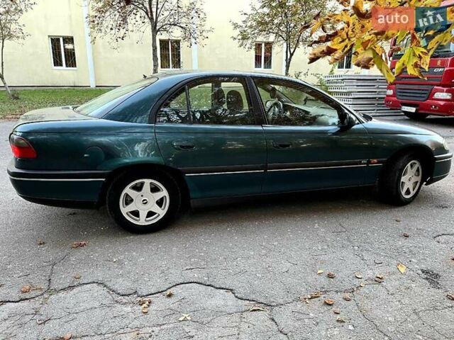 Опель Омега 1996 в Жмеренке на Automoto.ua Зеленый Опель Омега, объемом двигателя 2 л и пробегом 300 тыс. км за 2000 $, фото 1 на Automoto.ua