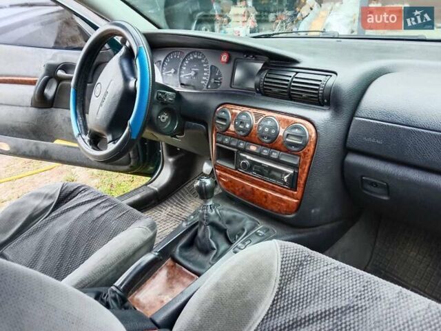 Зеленый Опель Омега, объемом двигателя 2 л и пробегом 360 тыс. км за 3000 $, фото 12 на Automoto.ua