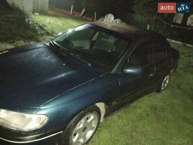 Зеленый Опель Омега, объемом двигателя 2 л и пробегом 423 тыс. км за 1500 $, фото 5 на Automoto.ua