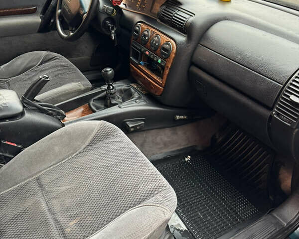 Зеленый Опель Омега, объемом двигателя 2 л и пробегом 250 тыс. км за 1250 $, фото 12 на Automoto.ua