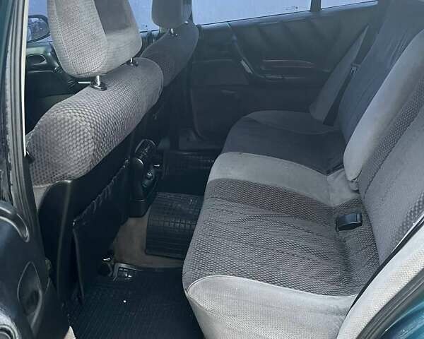 Зелений Опель Омега, об'ємом двигуна 2 л та пробігом 410 тис. км за 2600 $, фото 7 на Automoto.ua