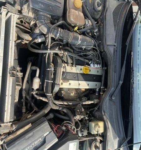 Зеленый Опель Омега, объемом двигателя 2 л и пробегом 350 тыс. км за 2500 $, фото 9 на Automoto.ua