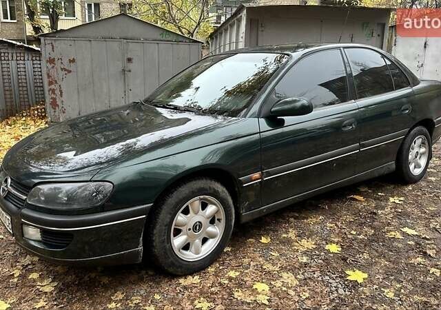 Зеленый Опель Омега, объемом двигателя 2 л и пробегом 341 тыс. км за 2500 $, фото 5 на Automoto.ua