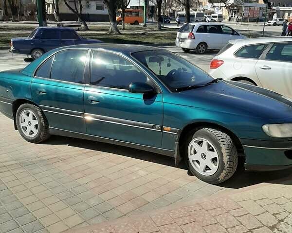 Зеленый Опель Омега, объемом двигателя 2 л и пробегом 286 тыс. км за 2500 $, фото 4 на Automoto.ua