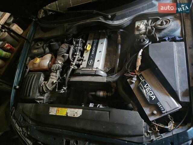 Зеленый Опель Омега, объемом двигателя 2 л и пробегом 261 тыс. км за 3200 $, фото 29 на Automoto.ua