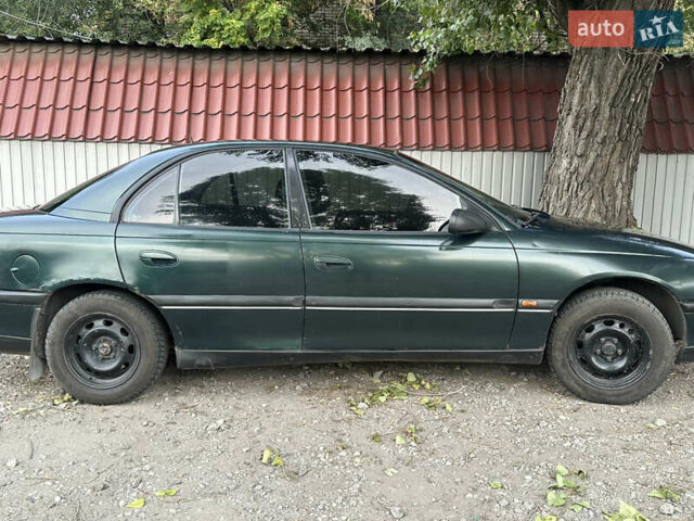 Зеленый Опель Омега, объемом двигателя 2 л и пробегом 607 тыс. км за 1499 $, фото 6 на Automoto.ua