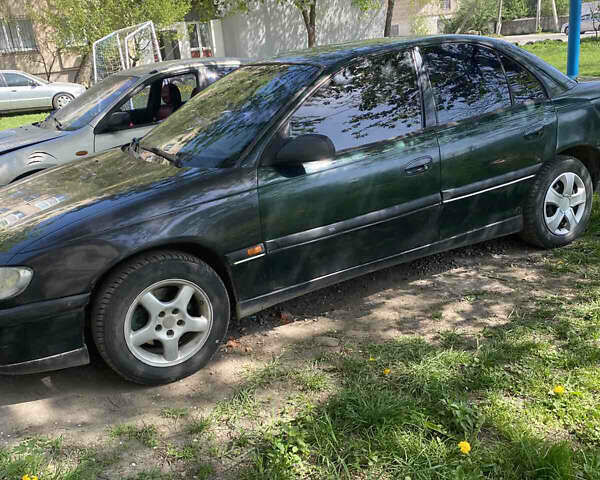 Опель Омега 1997 в Дунаевцах на Automoto.ua Зеленый Опель Омега, объемом двигателя 2 л и пробегом 290 тыс. км за 2000 $, фото 1 на Automoto.ua