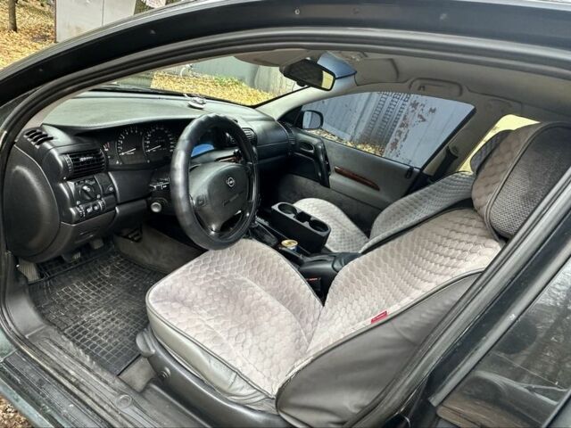 Зеленый Опель Омега, объемом двигателя 2 л и пробегом 341 тыс. км за 2500 $, фото 7 на Automoto.ua