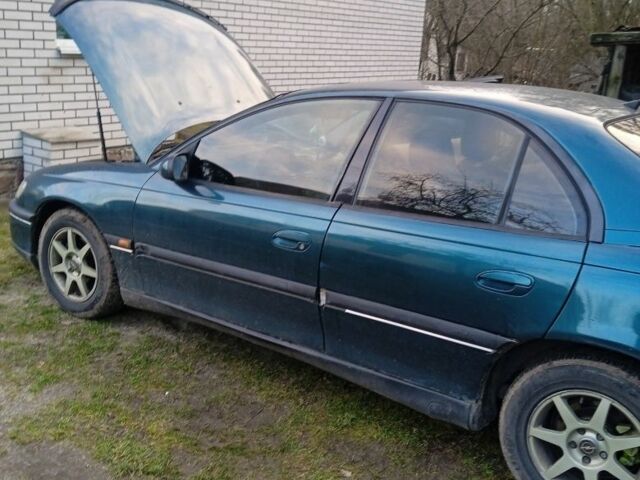 Зелений Опель Омега, об'ємом двигуна 2 л та пробігом 498 тис. км за 2500 $, фото 3 на Automoto.ua