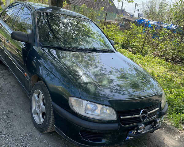 Опель Омега 1997 в Дунаевцах на Automoto.ua Зеленый Опель Омега, объемом двигателя 2 л и пробегом 290 тыс. км за 2000 $, фото 2 на Automoto.ua