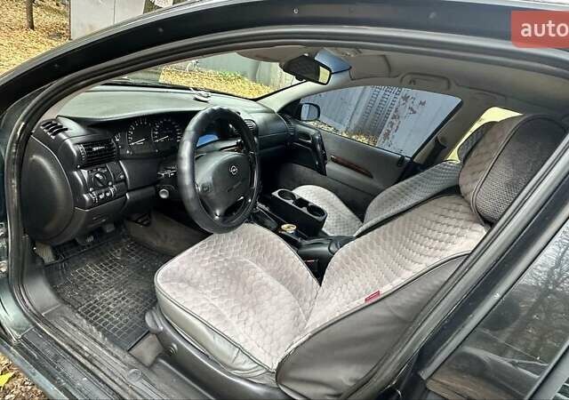 Зеленый Опель Омега, объемом двигателя 2 л и пробегом 341 тыс. км за 2500 $, фото 6 на Automoto.ua