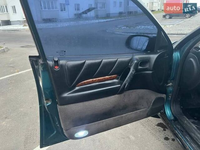 Зелений Опель Омега, об'ємом двигуна 2 л та пробігом 410 тис. км за 2600 $, фото 4 на Automoto.ua