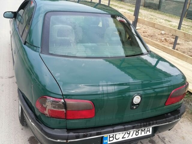 Зелений Опель Омега, об'ємом двигуна 2 л та пробігом 400 тис. км за 1300 $, фото 7 на Automoto.ua