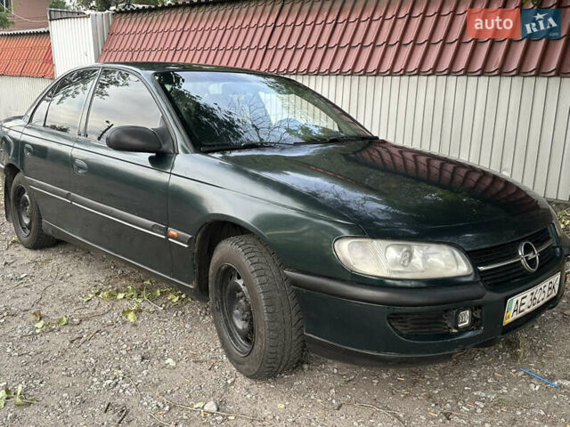 Зеленый Опель Омега, объемом двигателя 2 л и пробегом 607 тыс. км за 1499 $, фото 5 на Automoto.ua