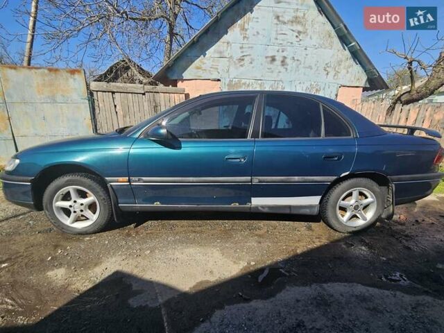 Зеленый Опель Омега, объемом двигателя 2 л и пробегом 261 тыс. км за 3200 $, фото 25 на Automoto.ua