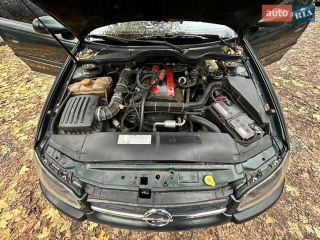 Зеленый Опель Омега, объемом двигателя 2 л и пробегом 341 тыс. км за 2500 $, фото 10 на Automoto.ua