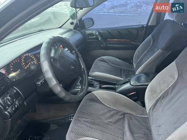 Зелений Опель Омега, об'ємом двигуна 2 л та пробігом 410 тис. км за 2600 $, фото 5 на Automoto.ua