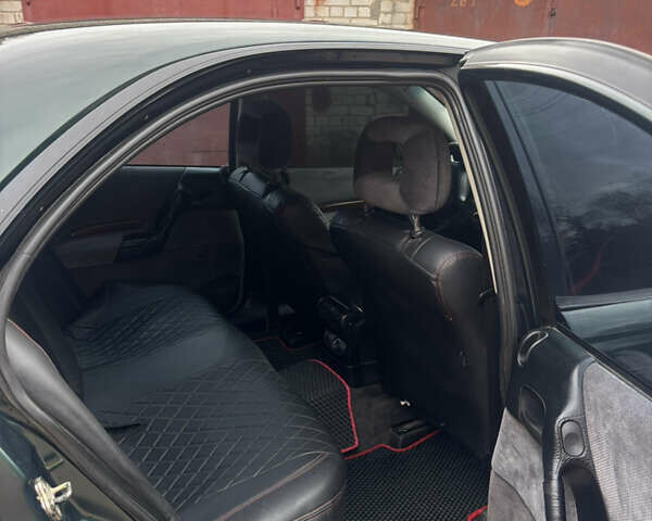 Зелений Опель Омега, об'ємом двигуна 2 л та пробігом 440 тис. км за 2750 $, фото 4 на Automoto.ua