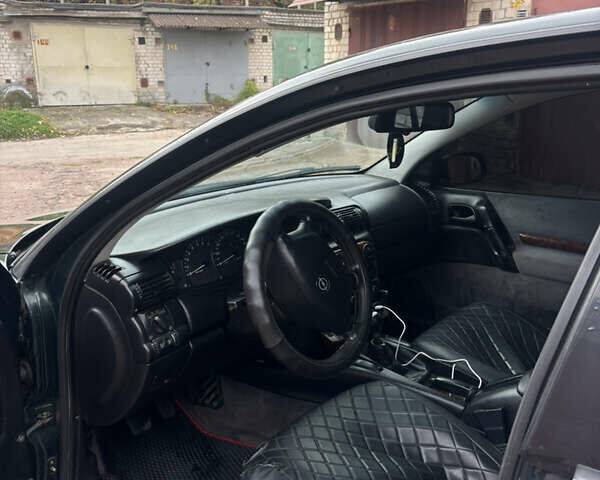 Зелений Опель Омега, об'ємом двигуна 2 л та пробігом 440 тис. км за 2750 $, фото 3 на Automoto.ua