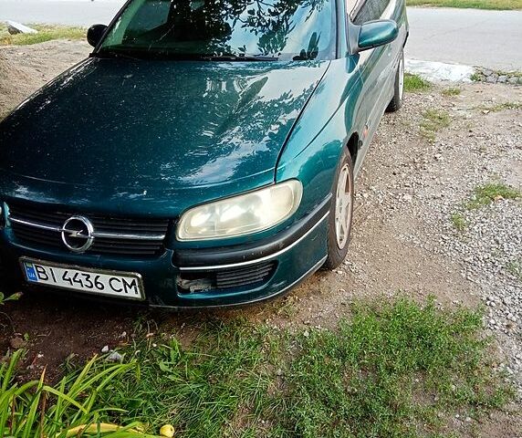 Зеленый Опель Омега, объемом двигателя 2 л и пробегом 250 тыс. км за 2000 $, фото 4 на Automoto.ua