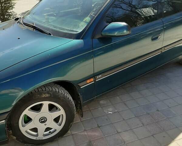Зеленый Опель Омега, объемом двигателя 2 л и пробегом 286 тыс. км за 2500 $, фото 3 на Automoto.ua