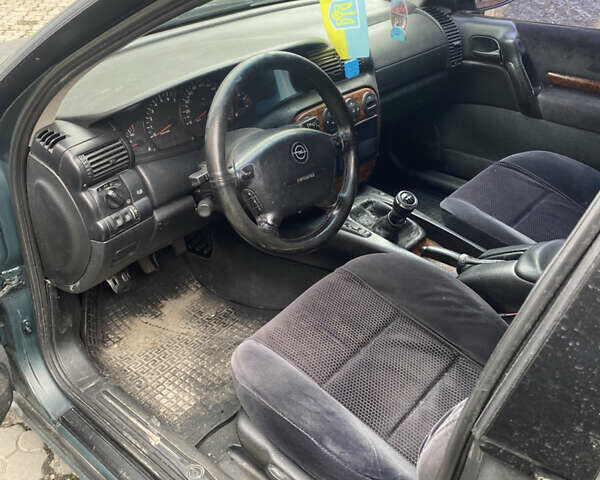 Опель Омега 1997 в Днепре (Днепропетровске) на Automoto.ua Зеленый Опель Омега, объемом двигателя 3 л и пробегом 400 тыс. км за 2500 $, фото 5 на Automoto.ua