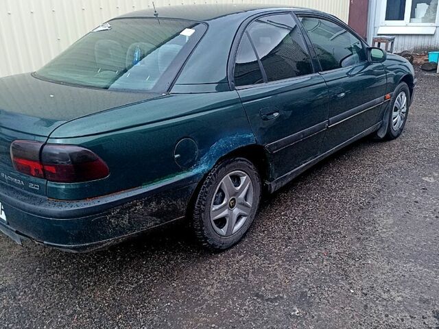 Зелений Опель Омега, об'ємом двигуна 2 л та пробігом 100 тис. км за 1600 $, фото 1 на Automoto.ua