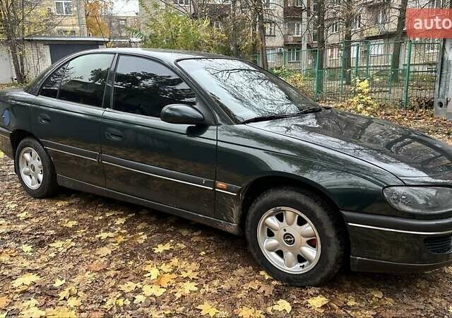 Зеленый Опель Омега, объемом двигателя 2 л и пробегом 341 тыс. км за 2500 $, фото 1 на Automoto.ua