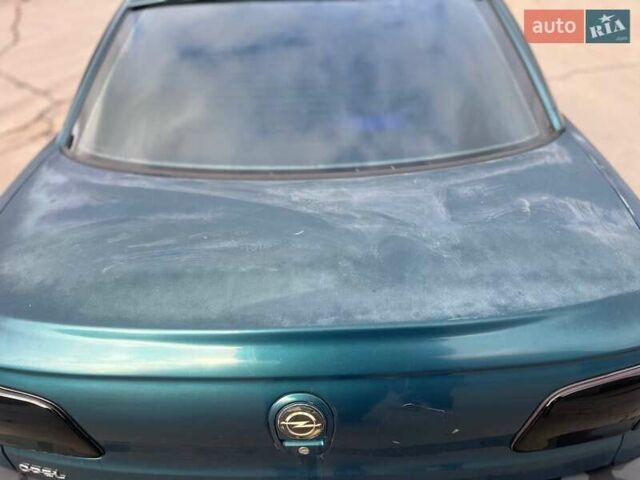 Зелений Опель Омега, об'ємом двигуна 2 л та пробігом 410 тис. км за 2600 $, фото 9 на Automoto.ua