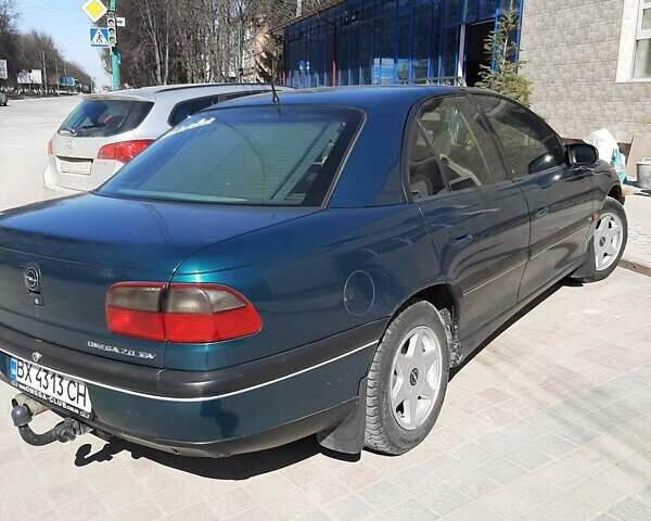 Зеленый Опель Омега, объемом двигателя 2 л и пробегом 286 тыс. км за 2500 $, фото 1 на Automoto.ua