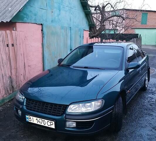 Зеленый Опель Омега, объемом двигателя 2 л и пробегом 261 тыс. км за 3200 $, фото 1 на Automoto.ua