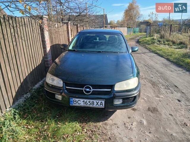 Зелений Опель Омега, об'ємом двигуна 2 л та пробігом 397 тис. км за 1000 $, фото 13 на Automoto.ua