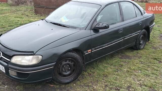 Зеленый Опель Омега, объемом двигателя 2 л и пробегом 328 тыс. км за 1600 $, фото 2 на Automoto.ua