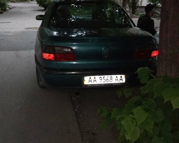 Зеленый Опель Омега, объемом двигателя 2 л и пробегом 236 тыс. км за 1500 $, фото 3 на Automoto.ua