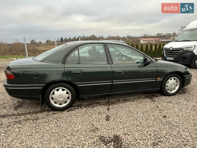 Зелений Опель Омега, об'ємом двигуна 2 л та пробігом 397 тис. км за 2500 $, фото 5 на Automoto.ua