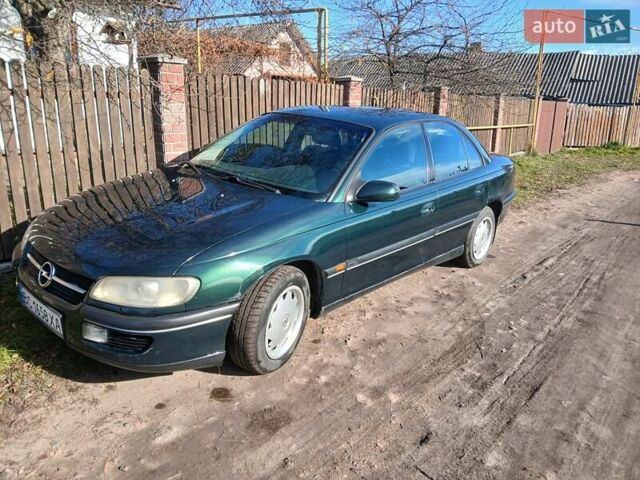 Зелений Опель Омега, об'ємом двигуна 2 л та пробігом 397 тис. км за 1000 $, фото 12 на Automoto.ua