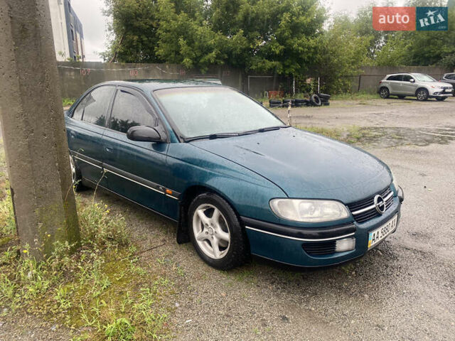 Зеленый Опель Омега, объемом двигателя 2 л и пробегом 298 тыс. км за 3200 $, фото 3 на Automoto.ua