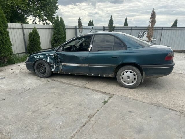 Зеленый Опель Омега, объемом двигателя 2 л и пробегом 240 тыс. км за 700 $, фото 2 на Automoto.ua