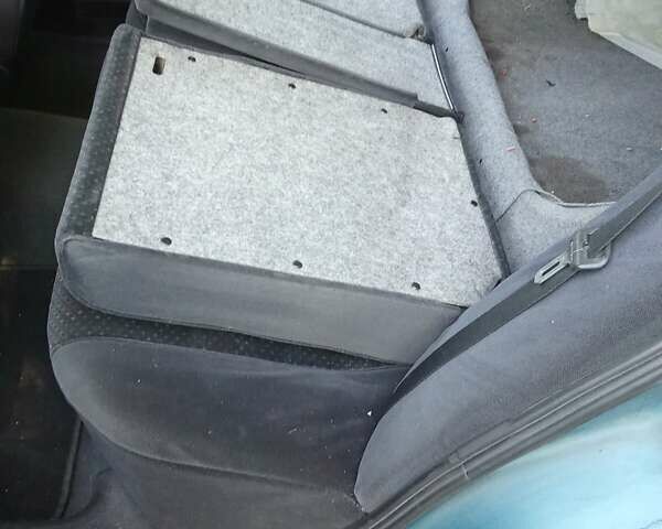 Зеленый Опель Омега, объемом двигателя 2 л и пробегом 236 тыс. км за 1500 $, фото 12 на Automoto.ua