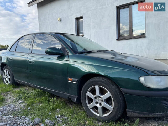 Зеленый Опель Омега, объемом двигателя 2 л и пробегом 300 тыс. км за 1700 $, фото 7 на Automoto.ua