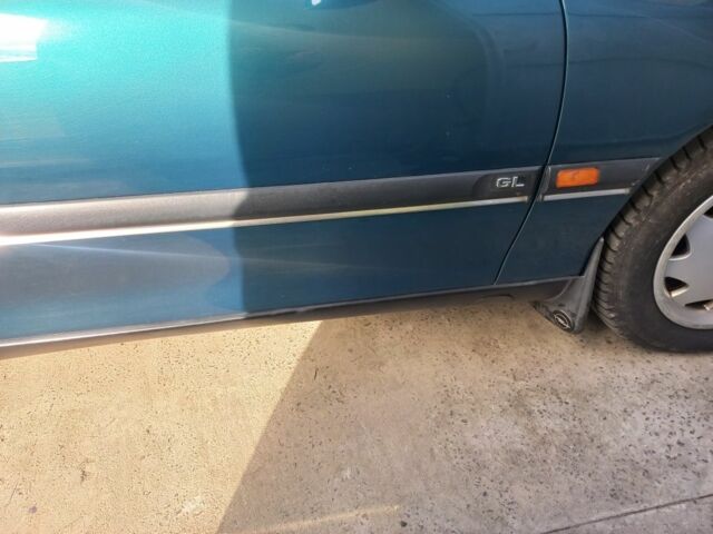 Зеленый Опель Омега, объемом двигателя 2 л и пробегом 402 тыс. км за 4000 $, фото 2 на Automoto.ua