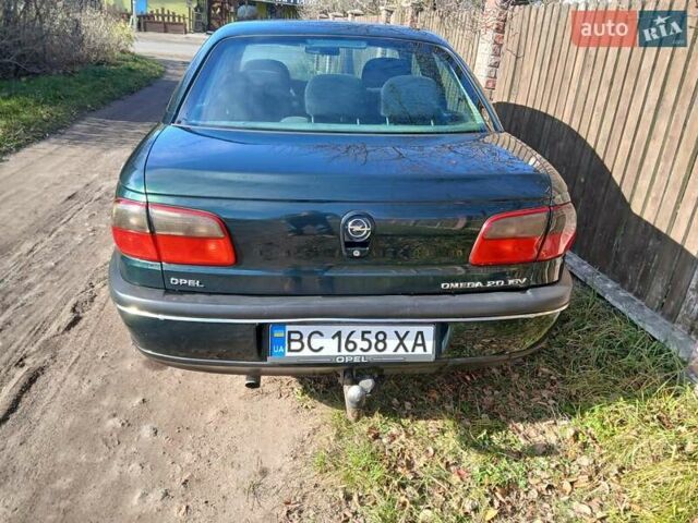 Зелений Опель Омега, об'ємом двигуна 2 л та пробігом 397 тис. км за 1000 $, фото 14 на Automoto.ua