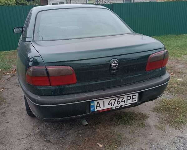 Зеленый Опель Омега, объемом двигателя 1.98 л и пробегом 300 тыс. км за 2000 $, фото 4 на Automoto.ua