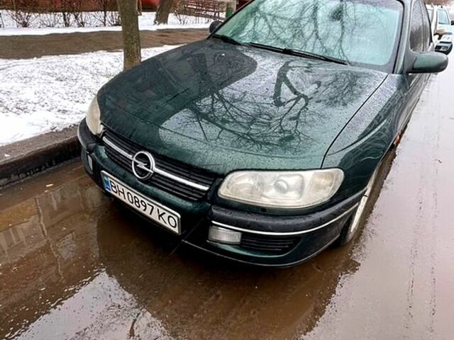 Зеленый Опель Омега, объемом двигателя 2.5 л и пробегом 588 тыс. км за 2500 $, фото 1 на Automoto.ua