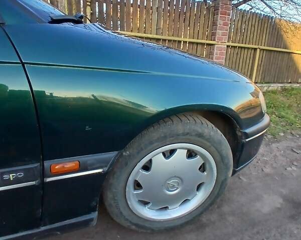 Зелений Опель Омега, об'ємом двигуна 2 л та пробігом 397 тис. км за 1000 $, фото 3 на Automoto.ua