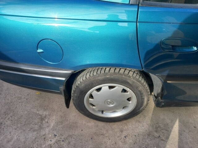 Зеленый Опель Омега, объемом двигателя 2 л и пробегом 402 тыс. км за 4000 $, фото 5 на Automoto.ua