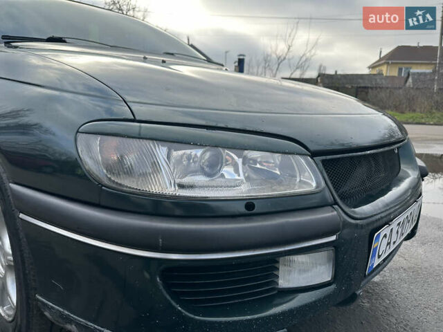 Зеленый Опель Омега, объемом двигателя 2.96 л и пробегом 345 тыс. км за 3000 $, фото 2 на Automoto.ua